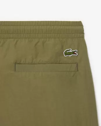 Oferta de Calções com Bolso com Fecho Relaxed Fit por 100€ em Lacoste