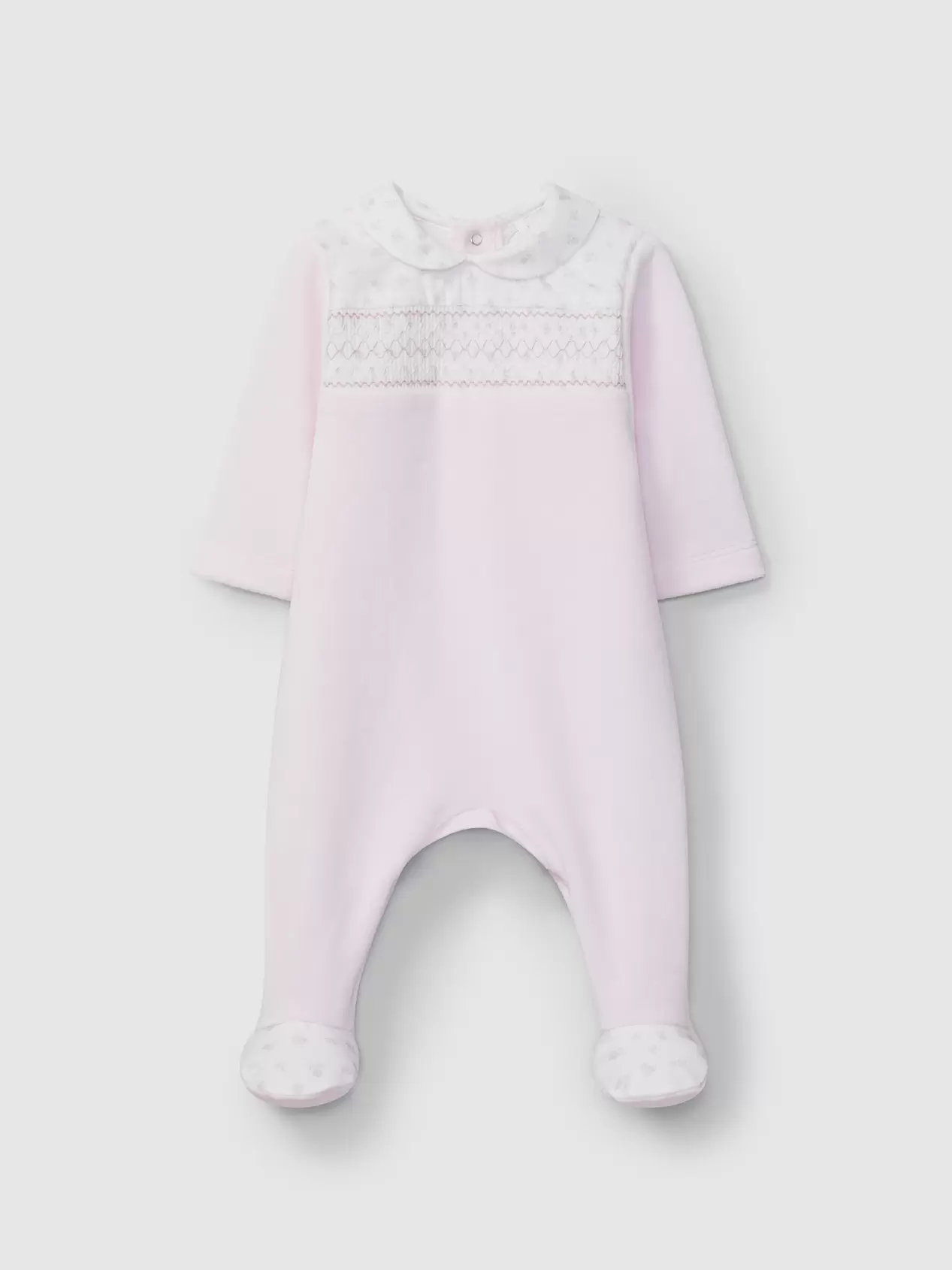 Oferta de Babygrow em veludo com smocks por 57€ em Laranjinha