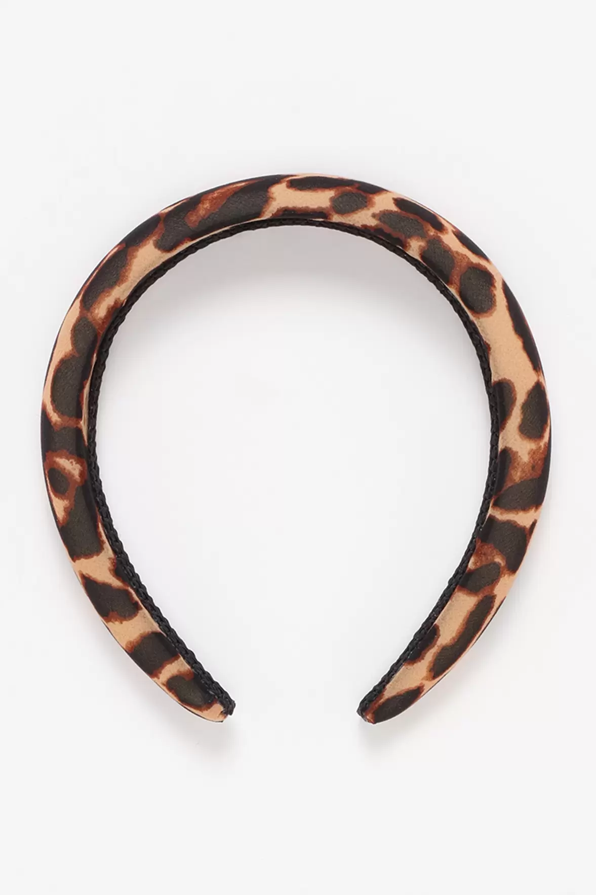 Oferta de Bandolete Acolchoada Animal Print por 3,99€ em Lefties