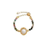 Oferta de Golden Ring w/ Glass Beads & Mother of Pearl por 23,8€ em Pedra Dura