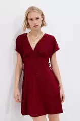 Oferta de Vestido curto túnica bordado suíço por 15,99€ em Springfield