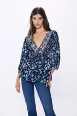 Oferta de Blusa impressa mix por 9,99€ em Springfield