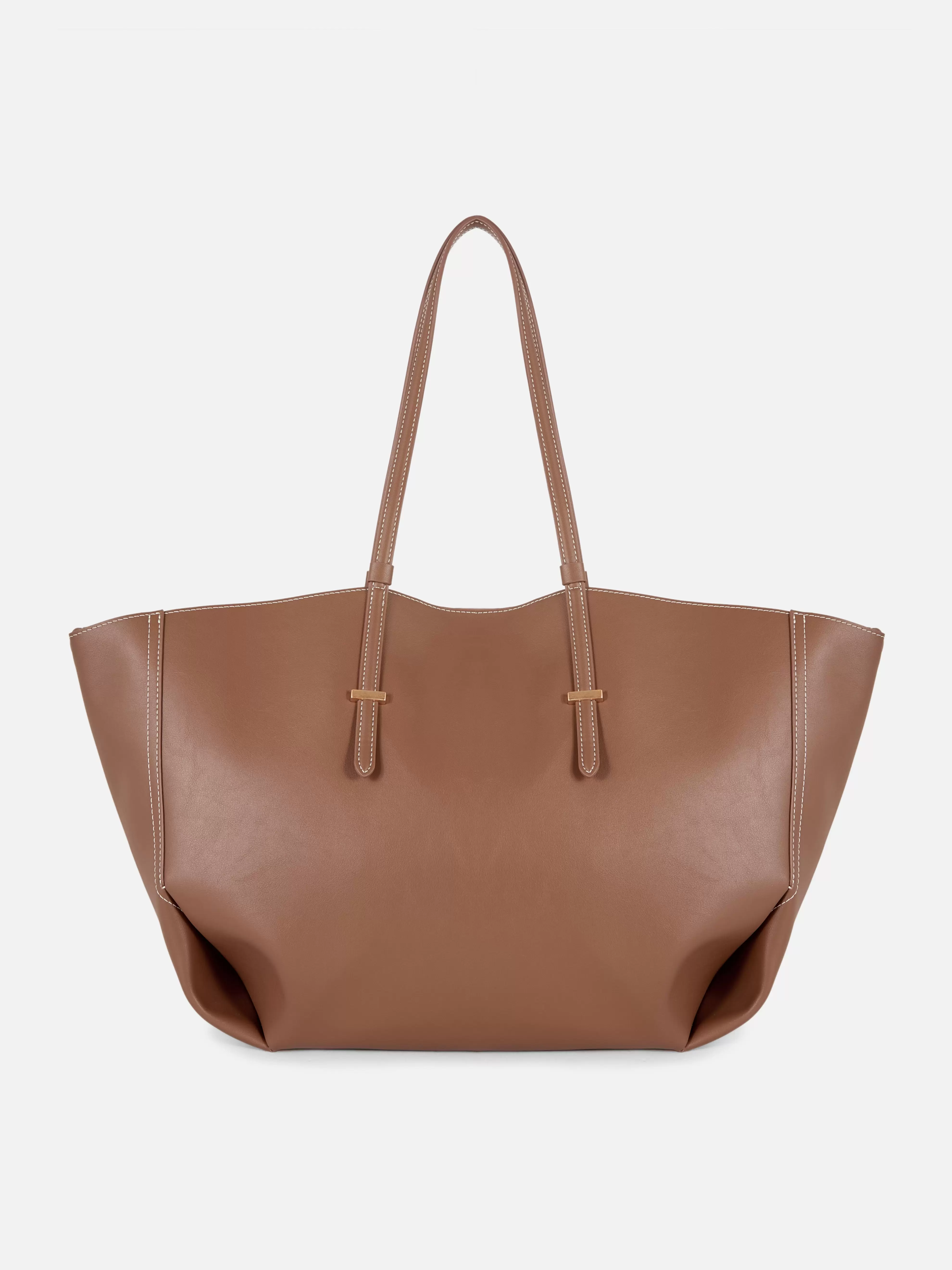 Oferta de Mala tote grande imitação pele The Edit por 25€ em Primark